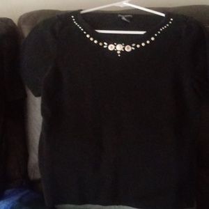 A black short sleeve casual sweater top